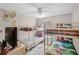 Playful ' bedroom with three bunk beds, cartoon bedding, and fun decor, great for a large Gathering at 4743 Vero Beach Pl, Kissimmee, FL 34746
