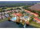 Aerial view of the community with a pool, clubhouse, playground, and lake at 4743 Vero Beach Pl, Kissimmee, FL 34746