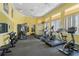 Community fitness center with modern equipment and natural light at 4743 Vero Beach Pl, Kissimmee, FL 34746