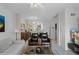 Spacious living area featuring comfortable seating, tile flooring, and an open layout at 4743 Vero Beach Pl, Kissimmee, FL 34746