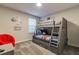 A bedroom features a bunk bed with Mickey Mouse decor at 481 Ocean Course Ave, Davenport, FL 33896