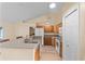 Kitchen features a bar area with wood cabinets and laminate countertops at 4811 Doc Dr, St Cloud, FL 34771