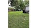 Lush backyard space featuring well-maintained lawn and shaded areas for outdoor enjoyment at 4834 Ute St, Orlando, FL 32819