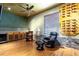 Game room features a bar, stylish floors, lighting, and accents at 4911 Lazy Oaks Way, St Cloud, FL 34771
