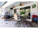 Cozy outdoor patio featuring comfortable seating and ceiling fans, perfect for relaxation at 4911 Lazy Oaks Way, St Cloud, FL 34771