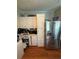 Functional kitchen with stainless steel refrigerator, ample storage cabinets, and countertop appliances at 50989 Highway 27 # 210, Davenport, FL 33897