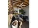 Relaxing covered patio with ample sunlight, ceiling fan, and stylish decor for outdoor enjoyment at 50989 Highway 27 # 210, Davenport, FL 33897