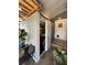 Exterior storage room with sliding barn door and overhead rafters at 50989 Highway 27 # 210, Davenport, FL 33897