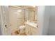 Bathroom featuring a glass-enclosed shower and sleek fixtures at 5275 Warrior Ln, Kissimmee, FL 34746