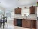 Cozy kitchen breakfast nook area with tile flooring and backyard views at 529 Eagle Pointe N, Kissimmee, FL 34746