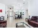 Spacious living room with tile flooring, modern furnishings, and abundant natural light at 529 Eagle Pointe N, Kissimmee, FL 34746