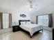 Comfortable main bedroom with ceiling fan and bright windows at 529 Eagle Pointe N, Kissimmee, FL 34746