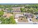 Aerial view showcasing the home's location, large lot, and proximity to community amenities at 6056 Hillside Heights Dr, Lakeland, FL 33812