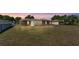 Beautiful backyard featuring a screened patio providing the perfect outdoor space at 6056 Hillside Heights Dr, Lakeland, FL 33812