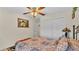 Charming bedroom with large closet, ceiling fan, and tasteful decor at 6056 Hillside Heights Dr, Lakeland, FL 33812