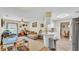View of the living room and kitchen, showcasing the open floor plan and natural light at 6056 Hillside Heights Dr, Lakeland, FL 33812
