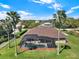 Aerial view of the property featuring a pool, backyard, and well-kept landscaping at 6132 Waterfield Way, St Cloud, FL 34771