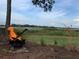 Backyard view with fire pit at 6132 Waterfield Way, St Cloud, FL 34771