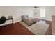 Inviting bedroom featuring cozy decor, a comfortable bed, and ample natural light at 6132 Waterfield Way, St Cloud, FL 34771