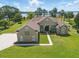 Beautiful home with lush lawn, nice landscaping, and lovely lake views from almost every angle at 6132 Waterfield Way, St Cloud, FL 34771