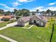 Beautiful home with a lush lawn and mature landscaping at 6132 Waterfield Way, St Cloud, FL 34771