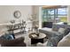 Comfortable living room with stylish furniture, tasteful decor, and access to the outdoor living area at 6132 Waterfield Way, St Cloud, FL 34771