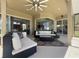 Covered outdoor patio with stylish furniture and great views at 6132 Waterfield Way, St Cloud, FL 34771