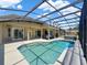 Beautiful screened pool, hot tub and lounge area provides the perfect outdoor living space at 6132 Waterfield Way, St Cloud, FL 34771