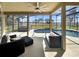 Screened lanai with pool and seating area at 6132 Waterfield Way, St Cloud, FL 34771
