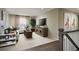 Cozy upstairs loft area is a versatile space for relaxation and entertainment at 614 Heritage Square Dr, Haines City, FL 33844