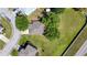 Birds eye view of a single Gathering home with a large lawn at 7316 Hunters Greene Cir, Lakeland, FL 33810