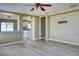 Open concept living room with modern floors at 7316 Hunters Greene Cir, Lakeland, FL 33810