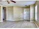 A light and airy living room showcases modern flooring and neutral paint tones at 7316 Hunters Greene Cir, Lakeland, FL 33810