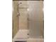 Modern walk-in shower with glass door and tiled walls at 7526 Pellham Way, Kissimmee, FL 34747
