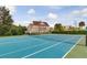 An outdoor tennis court provides a perfect recreational space for residents, enhancing their lifestyle at 7526 Pellham Way, Kissimmee, FL 34747