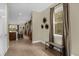 Inviting foyer featuring tile flooring, a window and access to the living areas at 7615 Brookhurst Ln, Kissimmee, FL 34747