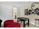 Another view of the game room showing a foosball table, bean bags, and arcade decor at 7615 Brookhurst Ln, Kissimmee, FL 34747