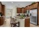 Modern kitchen with granite countertops and stainless steel appliances at 7615 Brookhurst Ln, Kissimmee, FL 34747