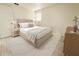 Nicely staged bedroom with coordinated furniture and decor at 817 Clay Blvd, Eustis, FL 32726