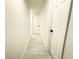 Hallway that leads to multiple rooms with doors at 817 Clay Blvd, Eustis, FL 32726