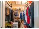 Walk-in closet with ample storage and organization, ready to accommodate all wardrobe needs at 845 Orchid Springs Dr, Winter Haven, FL 33884