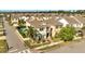 Aerial shot features a house with a pool, attractive landscaping, and a nice neighborhood setting at 8498 Powder Ridge Trl, Windermere, FL 34786