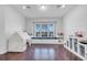Spacious playroom with hardwood floors, a built-in window seat, and plenty of storage for toys at 8498 Powder Ridge Trl, Windermere, FL 34786