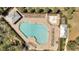 A stunning community pool area with plenty of seating and lounging space for residents to enjoy at 8498 Powder Ridge Trl, Windermere, FL 34786