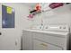 Efficient laundry room equipped with a washer and dryer, ready for all your laundry needs at 8534 Crystal Cove Loop, Kissimmee, FL 34747