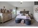Cozy bedroom with neutral tones, soft carpet, and decorative accents at 8999 Croquet Ct, Davenport, FL 33896
