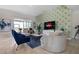 Comfortable living room featuring stylish decor, modern furniture, and streaming services at 8999 Croquet Ct, Davenport, FL 33896