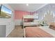 Charming ' bedroom with a bunk bed, a dresser, and themed decor for a playful atmosphere at 9190 Sommerset Hills Dr, Davenport, FL 33896