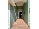 Inviting entryway showcasing a tile floor, arched ceiling, and a glimpse of the interior at 1149 E Grove Ave, Lake Wales, FL 33853