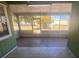 Enclosed screen patio overlooking a large yard at 1149 E Grove Ave, Lake Wales, FL 33853